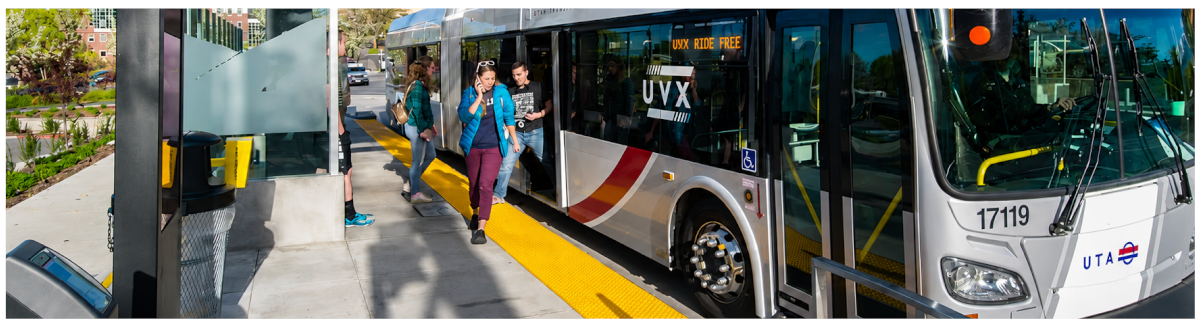passengers getting off a UTA bus at a stop